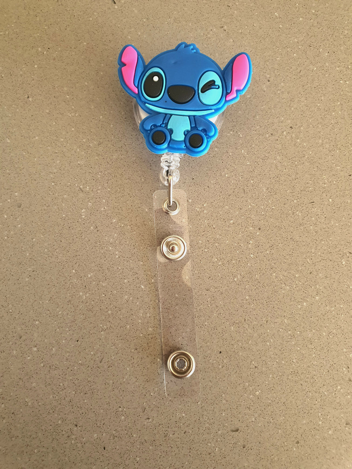 Kids cartoon badge reels with colorful designs and retractable ID card holders from PeppaTree Designs.