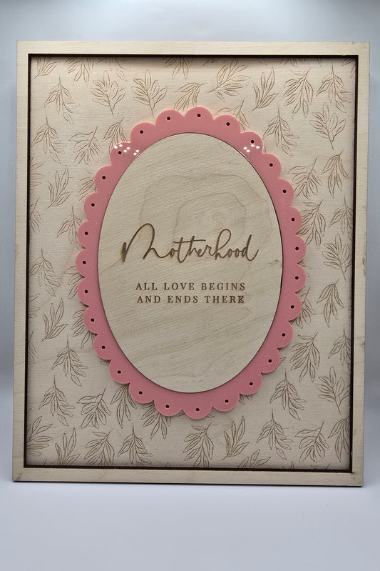 Decorative card with pink border and text on a beige background