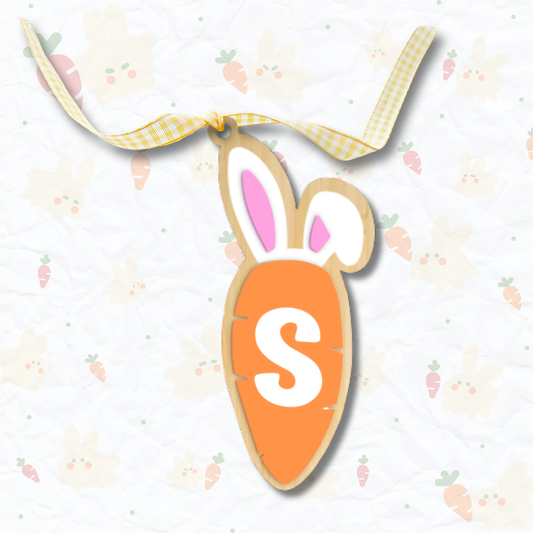 Carrot-shaped Easter decoration with bunny ears and a ribbon on a light background with Easter elements.