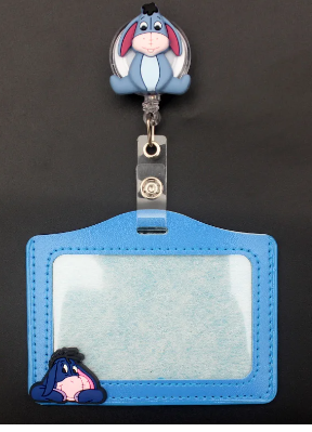 Blue Eeyore cartoon kids badge reel and ID card holder by PeppaTree Designs featuring playful animal design.
