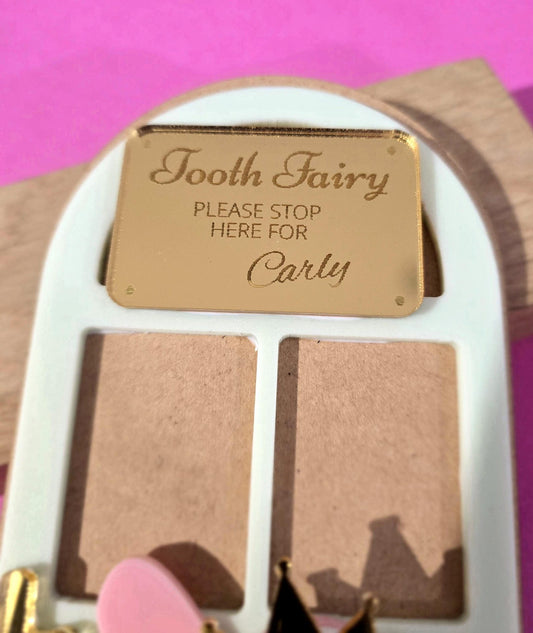 PeppaTree Designs Tooth Fairy Name Sign keychain with colorful design and engraved name, perfect for children's tooth fairy keepsake.