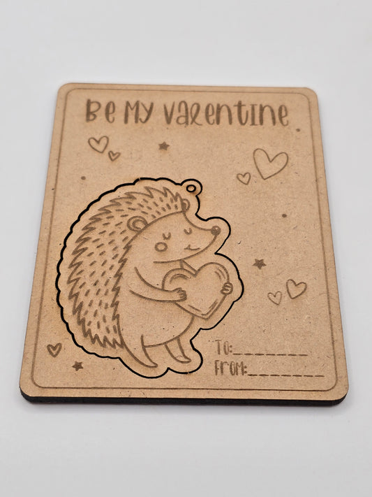 Valentine's Day card with a hedgehog holding a heart on a light gray background