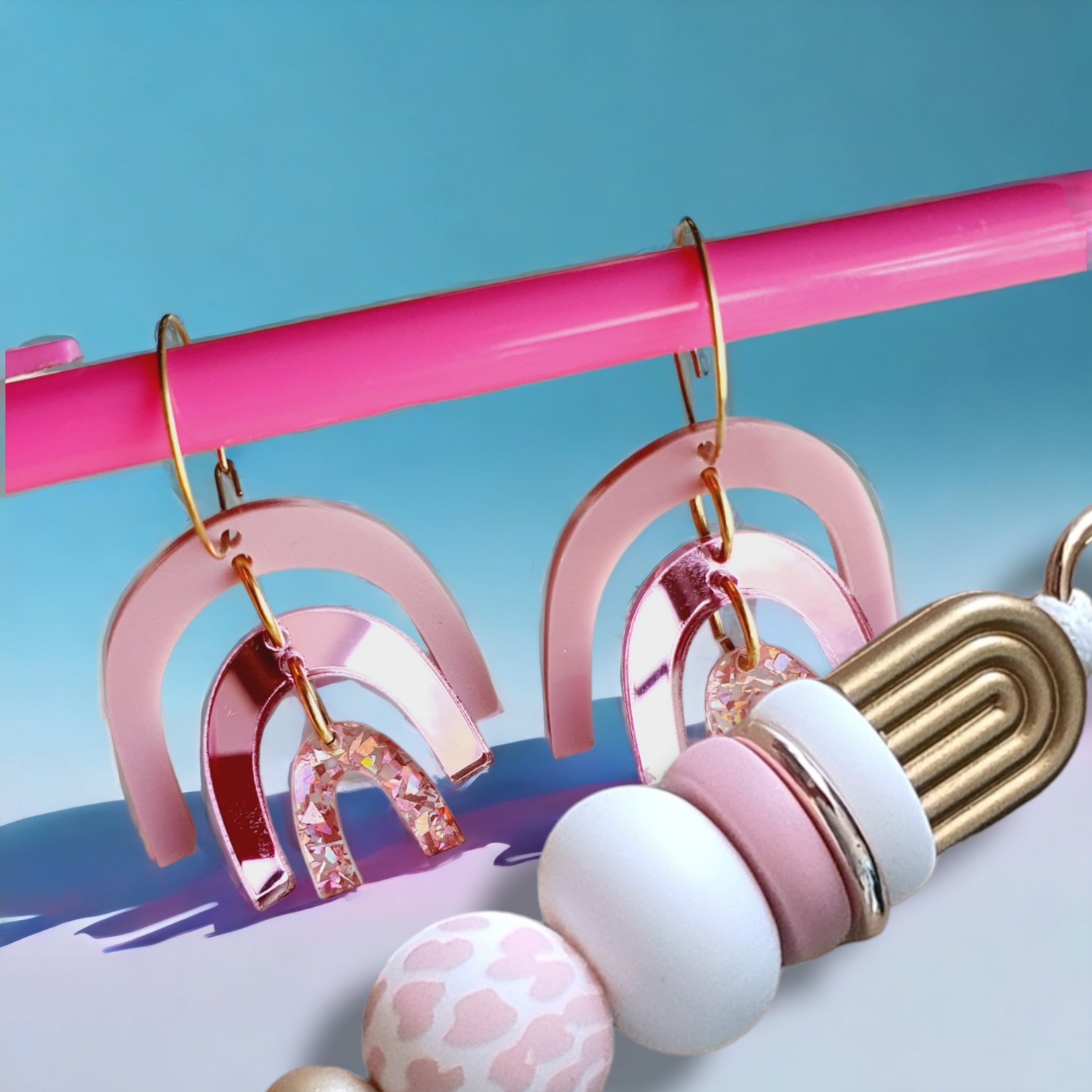 pink mirror acrylic earrings and pink gold keyring