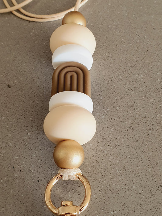 Hot Chocolate boho silicone beaded keyring by PeppaTree Designs, handmade keychain with colorful beads and arch design.