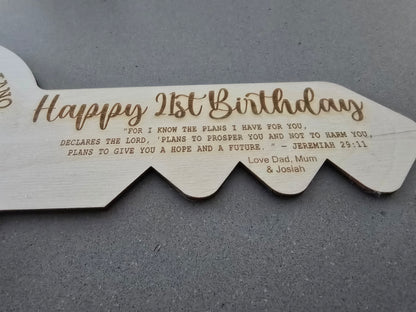 Laser cut custom engraved 21st key by PeppaTree Designs, featuring intricate design details on a metal key.