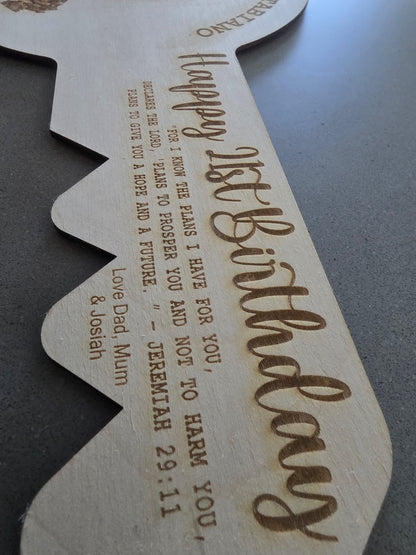 Laser-cut custom engraved 21st key by PeppaTree Designs, featuring intricate design details on the key.