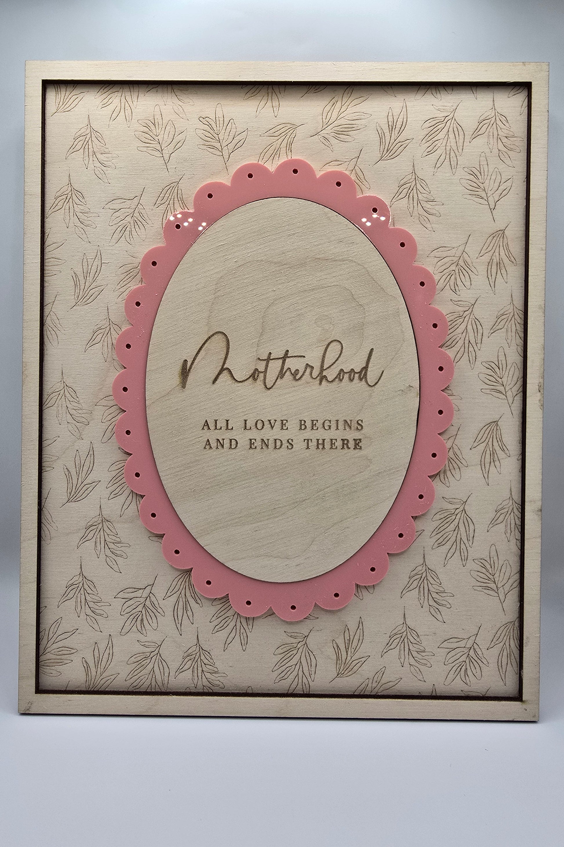 Decorative card with pink border and text on a beige background