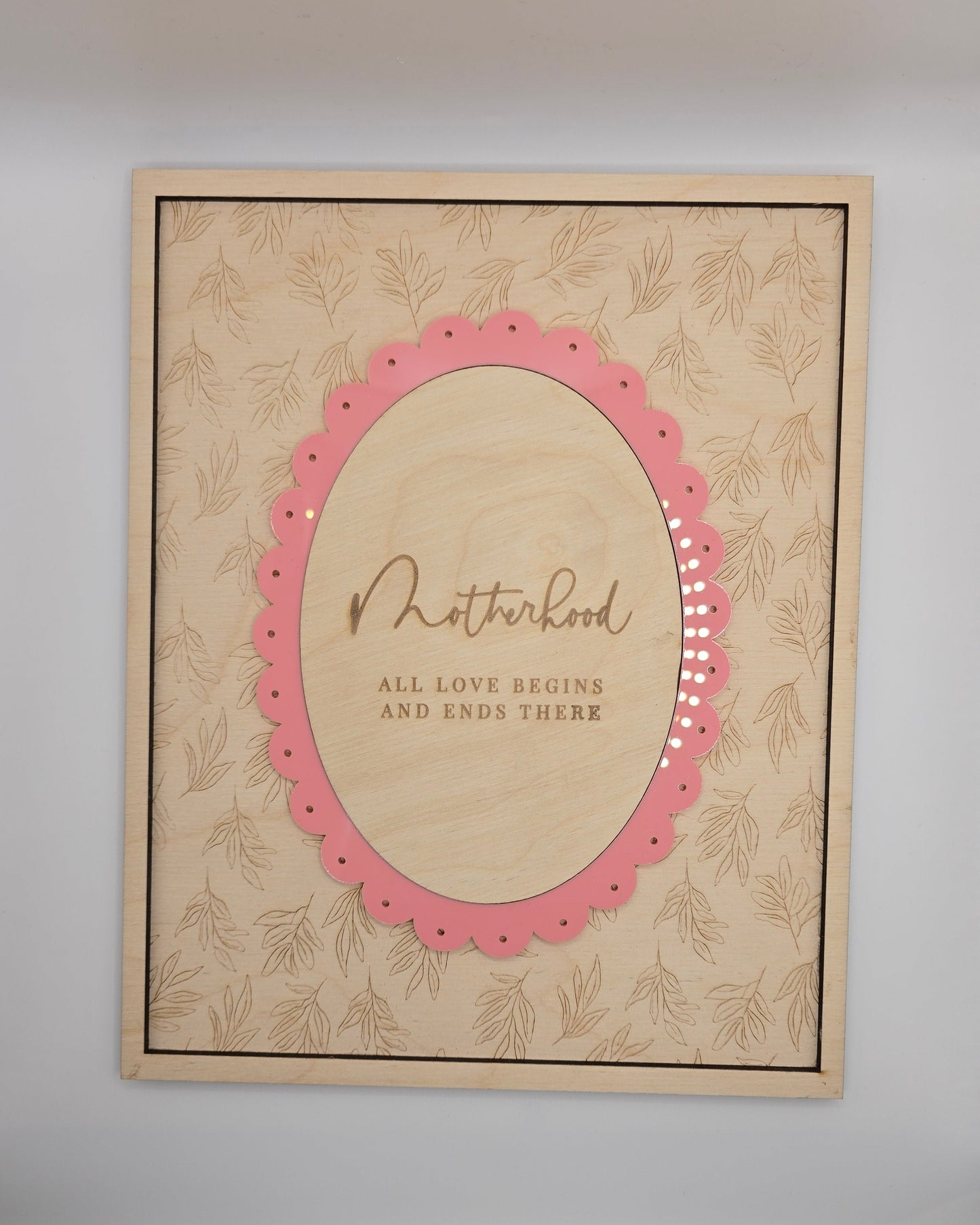 Decorative card with pink border and text on a white background