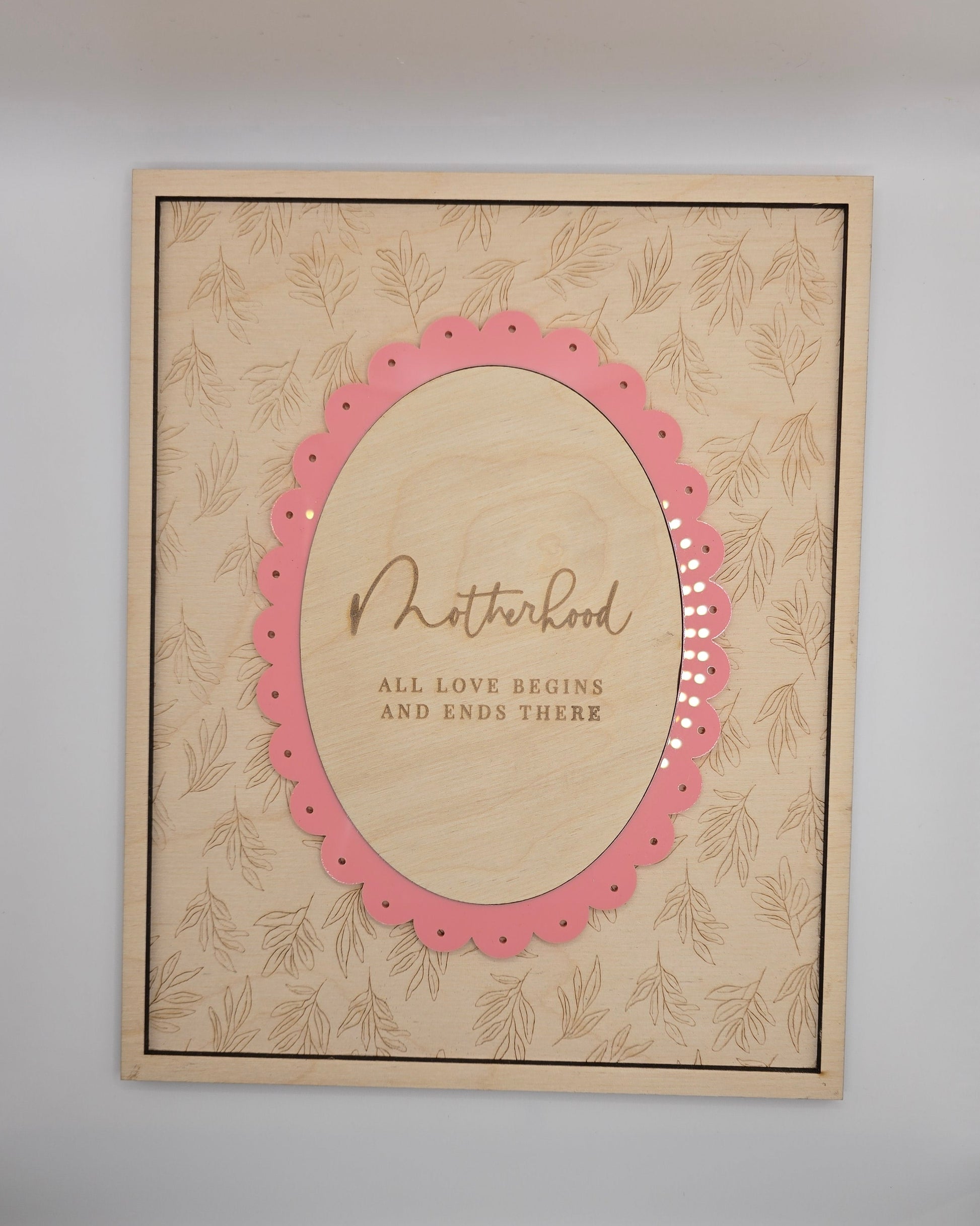 Decorative card with pink border and text on a white background