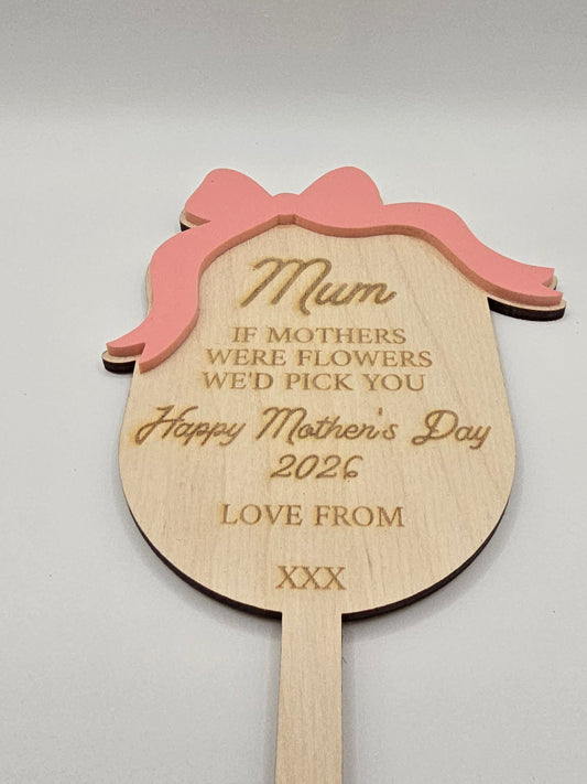 Personalised garden keepsake stakes by PeppaTree Designs, featuring five unique floral designs for outdoor decor.