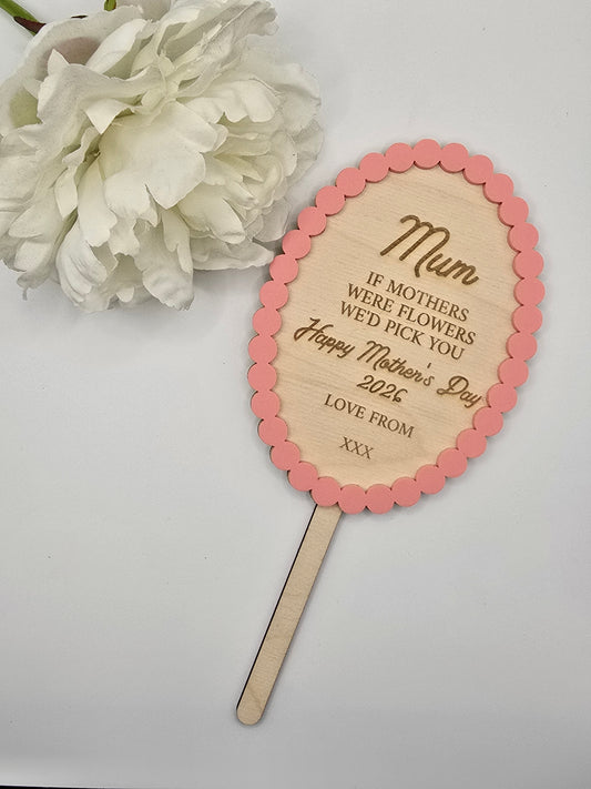 Custom flower and garden keepsake stakes by PeppaTree Designs, featuring five unique decorative designs for garden accents.