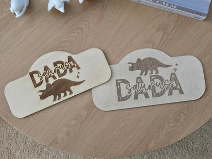 Two wooden stencils with 'Dadada' branding on a wooden surface.