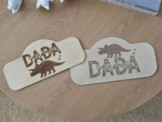 Two wooden stencils with 'Dadada' branding on a wooden surface.