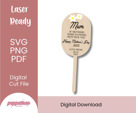 Wooden paddle with engraved message on a pink background, featuring text about laser readiness and digital cut files.