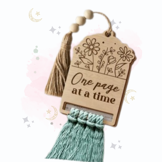 Colorful PeppaTree Designs bookmarks featuring various Easter-themed designs displayed on a wooden surface.