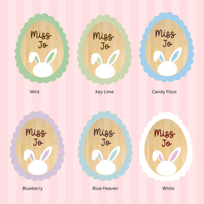 Easter badge name tag with colorful Easter-themed design by PeppaTree Designs, perfect for festive celebrations and name identification.