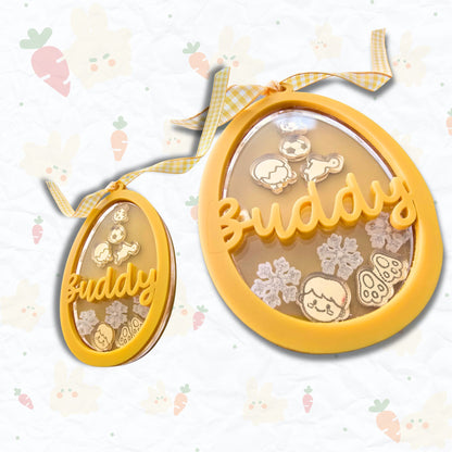 Custom Easter Egg Shaker Name Tag by PeppaTree Designs featuring a colorful decorated Easter egg with a personalized name tag.
