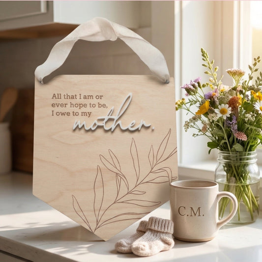 PeppaTree Designs wall sign with "For the mom who never asked for credit" message, decorative home decor for moms.