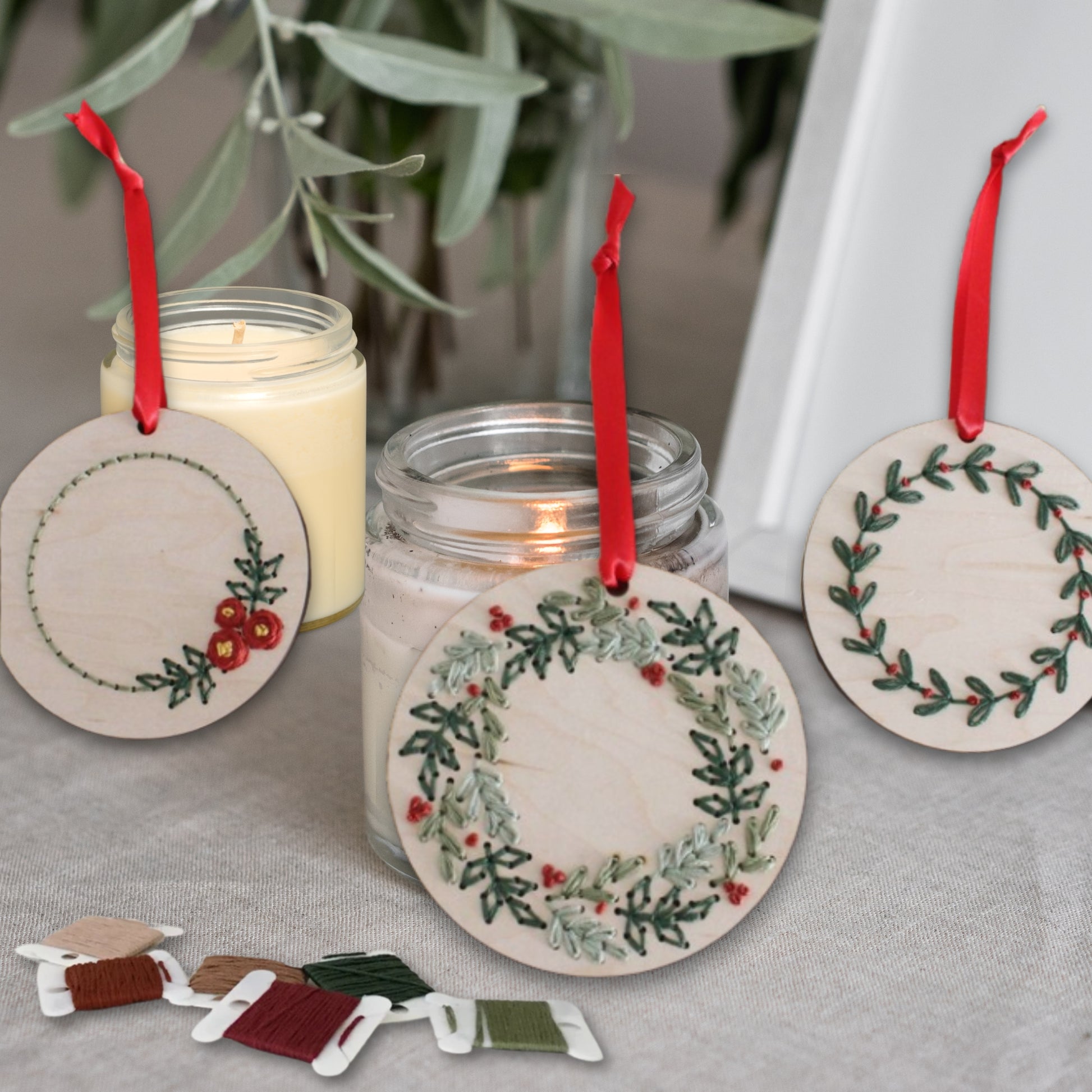 Laser cut embroidery Christmas wreath ornaments by PeppaTree Designs, featuring festive holiday designs on a 30x30cm mockup.