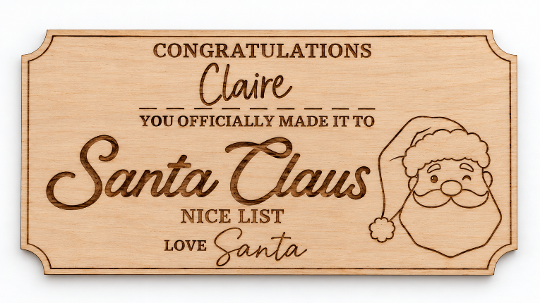 A personalized wooden plaque with engraved text reading 'Congratulations Claire you officially made it to Santa Claus Nice List Love Santa' and a line drawing of Santa's face and hat, shown on a white background.
