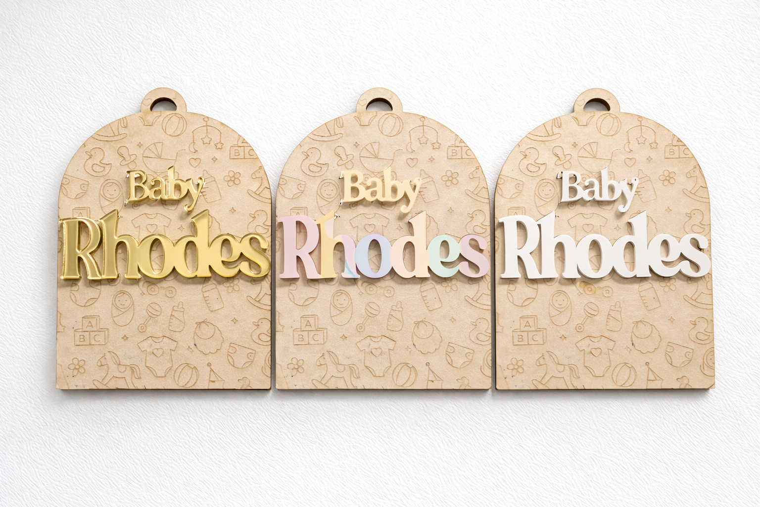 PeppaTree Designs arch baby announcement disc with customizable name on a decorative arch background for newborn celebration.