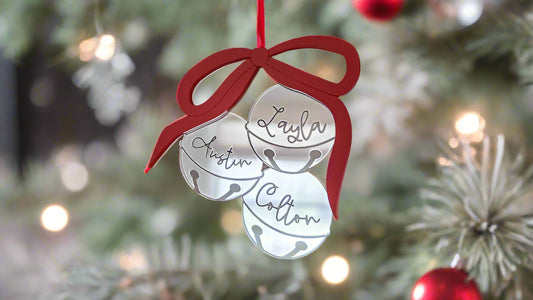 Decorative Christmas ornament with names on a tree