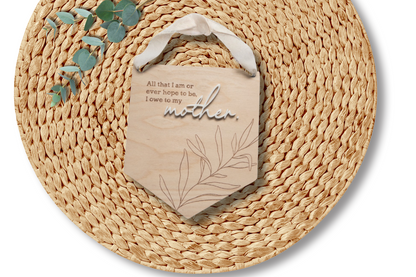 PeppaTree Designs wall sign with "Mother" inscription, decorative wall decor featuring elegant lettering and floral accents.