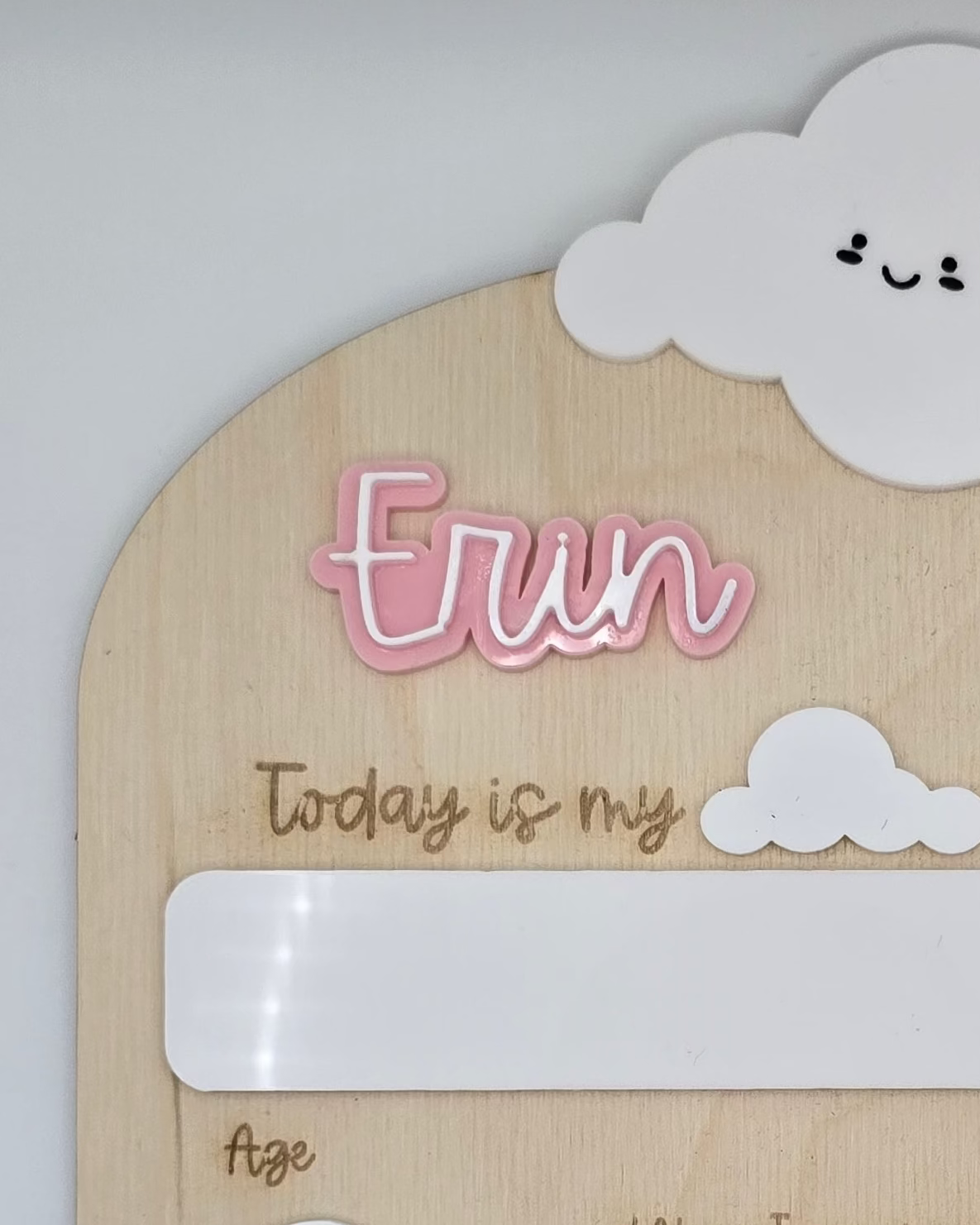 Children's activity sheet with cloud design and text on a plain background