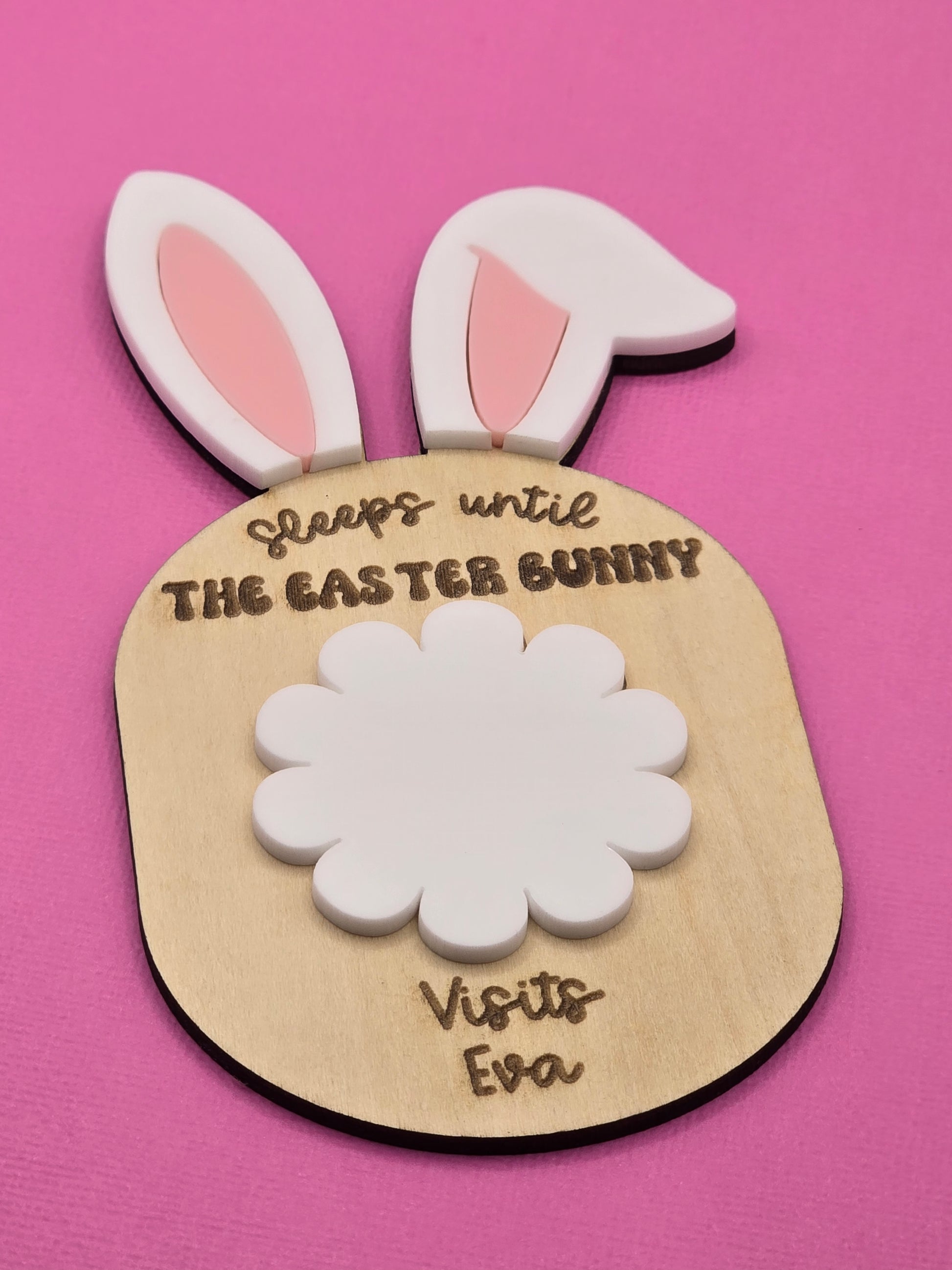 Easter countdown marker with bunny ears and flower design on a pink background