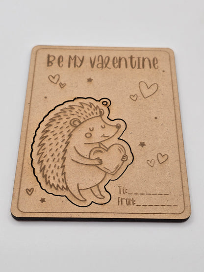 Valentine's Day card with a hedgehog holding a heart on a light gray background