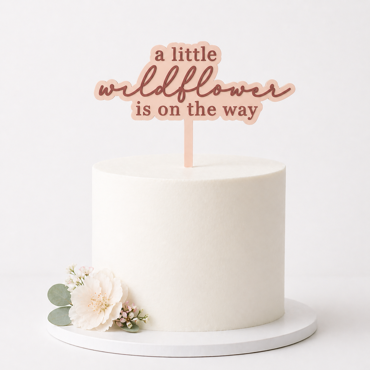 PeppaTree Designs wildflower cake topper with delicate flowers, perfect for party decor and celebrations.