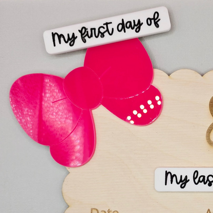 bow wood board school sign